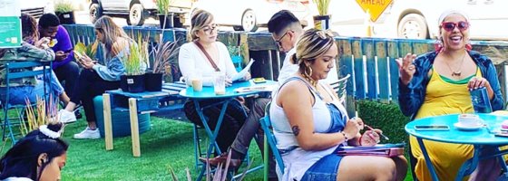 downtown modesto parklet with people at tables