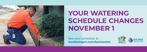 man fixing sprinkler