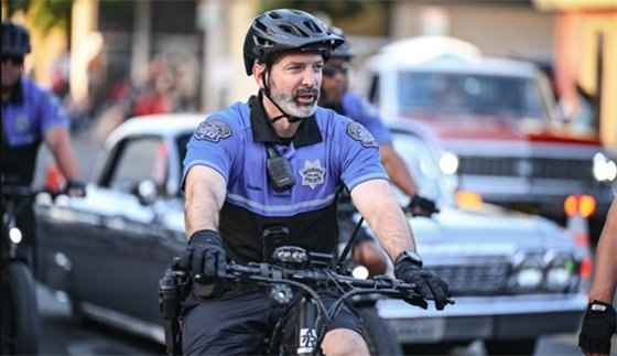 Modesto Police Officer on a Bike during the Graffiti Parade.