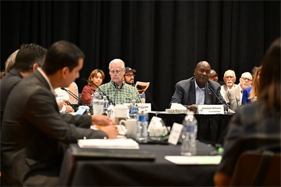 City Council Members sitting at a table at a meeting in Centre Plaza in Modesto. 